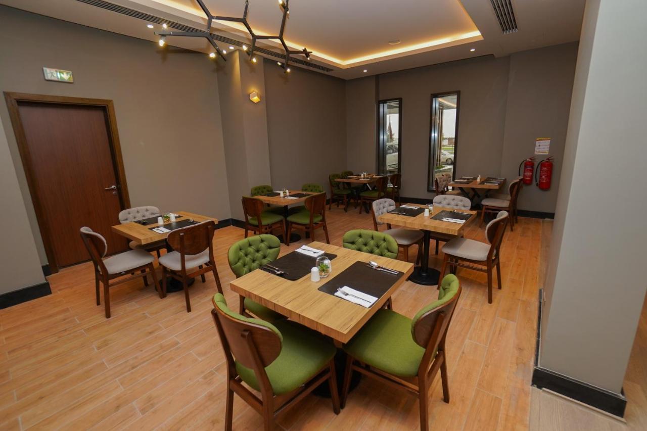 The Grand Lux Hotel 도하 외부 사진 The restaurant