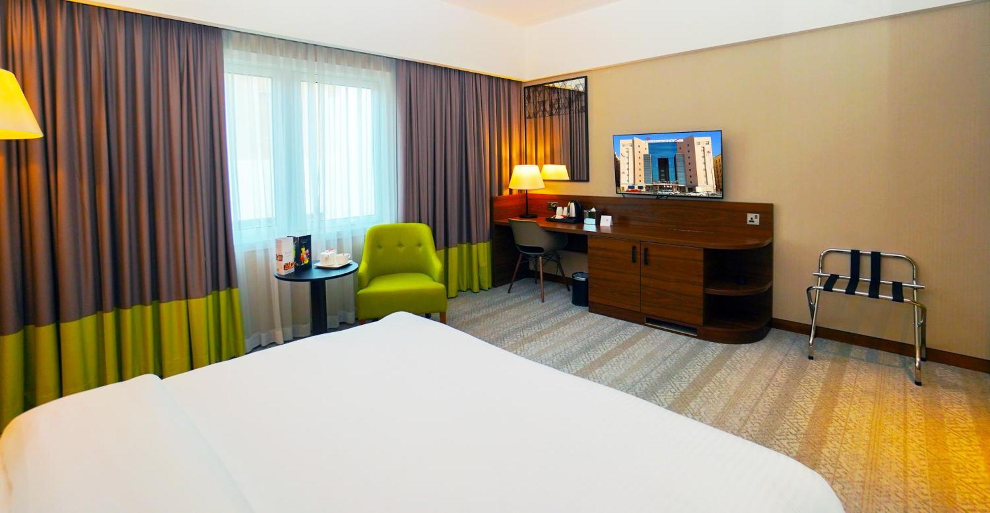 The Grand Lux Hotel 도하 외부 사진 A room at the hotel